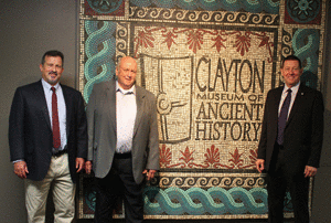 A picture of the mosaic at the entrance of the museum with Foster Stanback, John Clayton, and Steve Eckman.