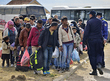 Refugees waiting to be allowed  in a country