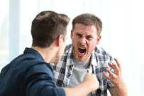 Two angry friends or roommates arguing and threatening each other