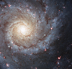 Messier 74, also called NGC 628, is a stunning example of a spiral galaxy