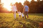 A family walking through a field.