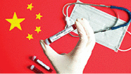 Nurse hand holding blood test-tube over Chinese flag with breathing mask and stethoscope.