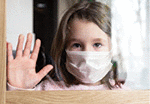 Portrait of sad kid during quarantine due to coronavirus pandemic.