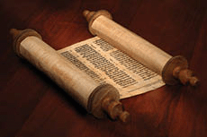 Ancient scrolls of papyrus paper with Hebrew text