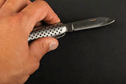 Man holding pocket knife