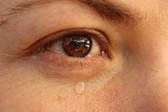 A picture of a tear near an eye.