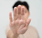 a hand showing stop.
