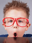 Little boy with big red glasses.