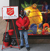 A volunteer collecting money for the Salvation Army.