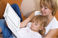 A mother reading to her child